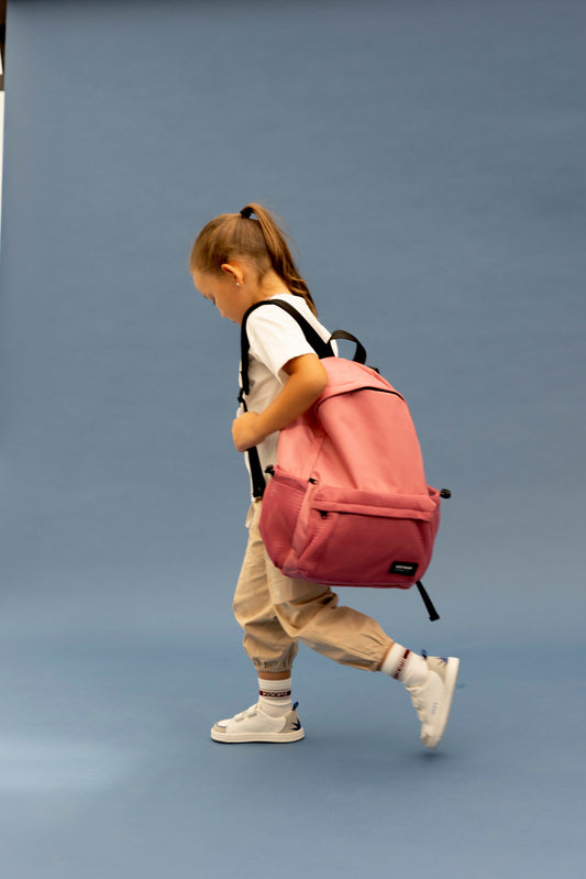 Child wearing barefoot school shoes